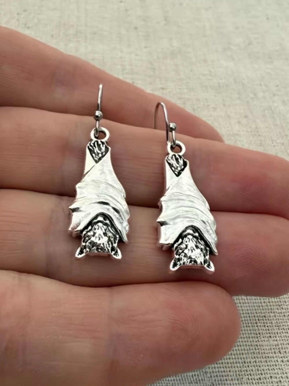 Silver Tone Hanging  Bat Wrapped in Wings Dangle Earrings  1” long - Picture 3 of 7